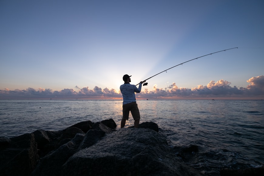 Land based game fishing at sunset